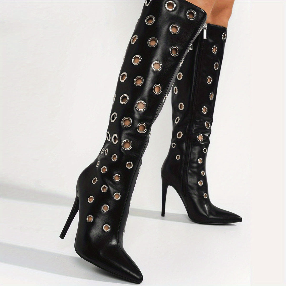 Stiletto high heels, knee high boots with holes